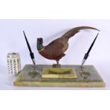 A LARGE EARLY 20TH CENTURY AUSTRIAN COLD PAINTED BRONZE AND ONYX DESK STAND formed as a pheasant 40