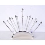 A SILVER PLATED DRESSER STYLE TOAST RACK. 17 cm x 22 cm.