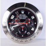 A Contemporary Rolex dealership style wall clock 34 cm.