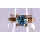 A 10CT GOLD AND TOPAZ RING. 3 grams. M/N.