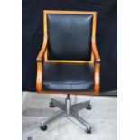 A Faultless Doerner wooden and upholstered swivel desk chair 108 x 54 x 44 cm.