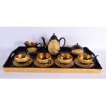 A CHINESE REPUBLICAN PERIOD BLACK AND GOLD LACQUERED SERVING SET comprising of coffee pot, sugar bas