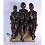 A LARGE 19TH CENTURY AUSTRIAN COLD PAINTED TERRACOTTA GROUP modelled as three young boys. 55 cm x 35