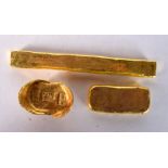 THREE CHINESE YELLOW METAL INGOTS. 281 grams. Largest 12 cm x 1.5 cm. (3)