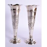 A PAIR OF EDWARDIAN SILVER VASES. London 1905. 762 grams overall. 18.5 cm x 7.25 cm.