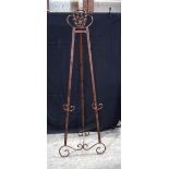 A large floor standing wrought iron easel/picture stand 148 x 52 x 45 cm