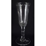 AN ANTIQUE WINE GLASS. 17 cm high.