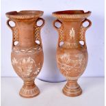 A near pair of Greek terracotta vases 32 cm.