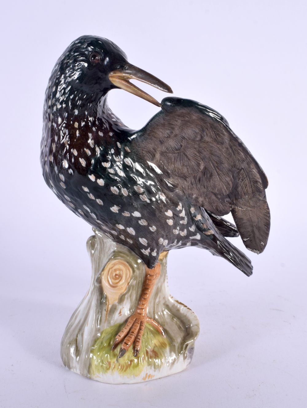 A 19TH CENTURY MEISSEN PORCELAIN FIGURE OF A BIRD. 16 cm x 8 cm.