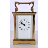 A FRENCH BRASS CARRIAGE CLOCK. 15 cm high inc handle.