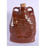 AN EXTREMELY RARE UNIQUE WADE TWIN HANDLED POTTERY FLASK bearing personal inscription to the body. 1