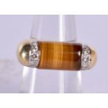 A 14CT GOLD DIAMOND AND TIGERSEYE RING. 9.4 grams. M.