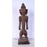 An African Tribal Senufo figure 34 cm.