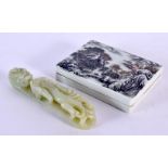 A CHINESE QING DYNASTY CARVED JADE BELT HOOK together with a porcelain box and cover. Largest 14 cm