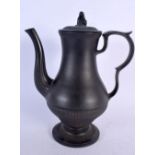 A 19TH CENTURY ENGLISH BLACK BASALT COFFEE POT AND COVER together with an unusual black basalt plaqu