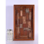 AN UNUSUAL MID CENTURY CARVED WOOD COPPER STAMP PANEL. 38 cm x 18 cm.