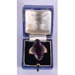 A 9CT GOLD AMETHYST RING. 6.6 grams. V.