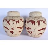 AN UNUSUAL PAIR OF 19TH CENTURY CHINESE TWO COLOUR CINNABAR LACQUER GINGER JARS AND COVERS decorated