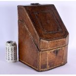 A LARGE 18TH CENTURY COUNTRY HOUSE LEATHER STATIONARY BOX decorated with foliage. 36 cm x 22 cm.