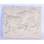 A CARVED PLASTER ROAMING HORSE RECTANGULAR PANEL. 34 cm x 28 cm.