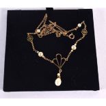 A 9CT GOLD AND SEED PEARL NECKLACE. 2.3 grams. 30 cm long.