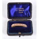 A CASED VICTORIAN ANTIQUE GOLD SCARF RING SET WITH CORAL BEADS. 2.9cm x 1.3cm, weight 3.7g