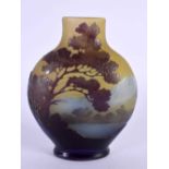 A FINE EARLY 20TH CENTURY FRENCH GALLE TRIPLE LAYER GLASS VASE decorated with landscapes. 12 cm x