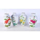 A set of four Limoges porcelain vase, decorated with foliage, inspired by P J Redoute. 30 cm (4).