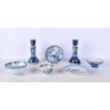 A collection of Chinese and Japanese porcelain items Tea bowls, bowls, Candlesticks etc (7)