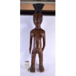 A LARGE EARLY 20TH CENTURY AFRICAN CARVED HARDWOOD TRIBAL MANGBETU FIGURE modelled as a female