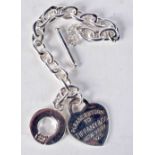 A SILVER TIFFANY BRACELET. Stamped 925, 19cm long, weight 26.4g