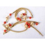 AN 18CT GOLD AND CORAL NECKLACE. Stamped 18K 750. 88cm long, weight 44.8g