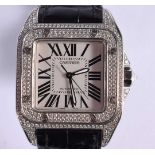 A BOXED SANTOS 100 DIAMOND ENCRUSTED WRISTWATCH. 3.75 cm wide inc crown.