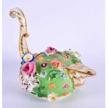 AN UNUSUAL EARLY 19TH CENTURY BLOOR DERBY OIL TEAPOT encrusted with flowers. 11 cm x 13 cm.