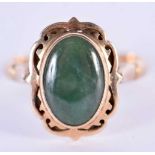 A CHINESE 14CT GOLD AND JADEITE RING. M. 3.5 grams.
