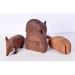 A collection of carved wooden Armadillos in different styles. 20 x 12cm (3).