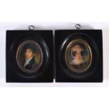 A PAIR CONTEMPORARY PORTRAIT MINIATURES. 11 cm x 10 cm.