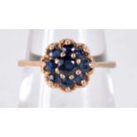 A 14CT GOLD, SAPPHIRE AND DIAMOND CLUSTER RING. Stamped 14K, Size M, weight 2.1g