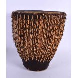 AN AFRICAN TRIBAL HIDE AND SKIN MOUNTED DRUM. 25 cm x 20 cm.