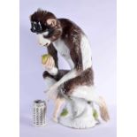 A LARGE 19TH CENTURY GERMAN PORCELAIN FIGURE OF AN APE modelled in the Meissen manner, modelled