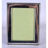 A MODERN ENGLISH SILVER PHOTOGRAPH FRAME. 16 cm x 12 cm.