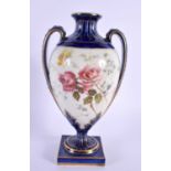 A 19TH CENTURY ROYAL WORCESTER TWIN HANDLED VASE painted with flowers. 18 cm x 10 cm.