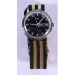 A TIMEX BLACK DIAL WRISTWATCH. 3.75 cm wide inc crown.