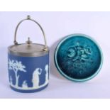 A WEDGWOOD BLUE JASPERWARE BISCUIT BARREL AND COVER together with an antique Minton blue glazed