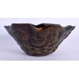 A CHINESE CARVED BUFFALO HORN BOWL 20th Century. 12 cm wide.