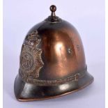 A VINTAGE METROPOLITAN COPPER POLICE HELMET BELL. 7.5 cm x 5.5 cm.