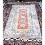 A Turkish wool rug 283 x 182 cm .