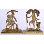 A PAIR OF 19TH CENTURY FRENCH BRASS DESK ORNAMENTS depicting tribal figures. 9 cm x 7 cm.