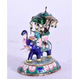 AN INDIAN SILVER AND ENAMEL FIGURE OF AN ELEPHANT. 44 grams. 6.5 cm x 5.25 cm.