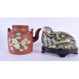 A LATE 19TH CENTURY CHINESE YIXING POTTERY TEAPOT AND COVER enamelled with flowers, together with